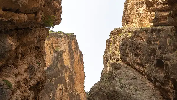 Steep limestone walls and river scenery in Osumi Canyon, Albania