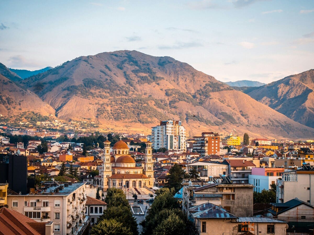 Korca city and the Resurrection Cathedral backed by mountains in southeast Albania