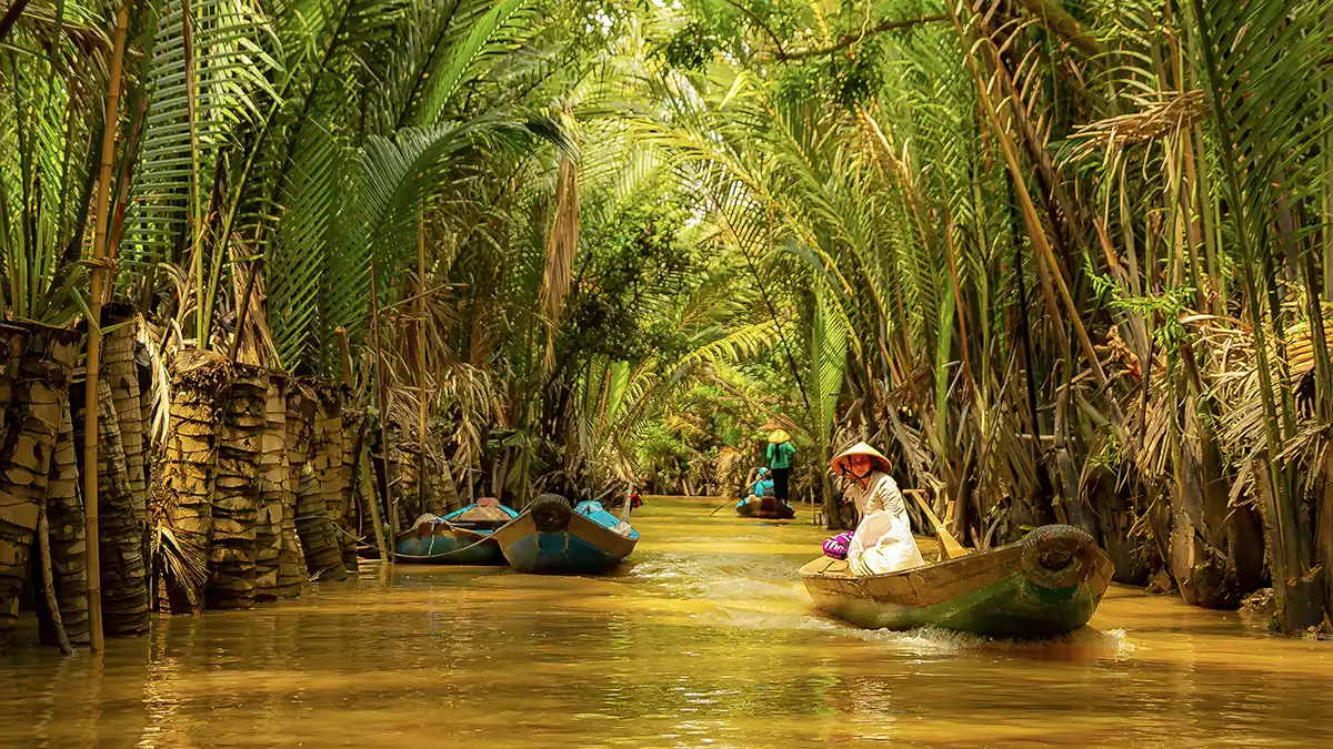 Boat on a canal in the Mekong Delta during a Vietnam backpacking route