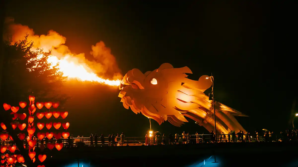 Dragon Bridge lit up at night in Da Nang
