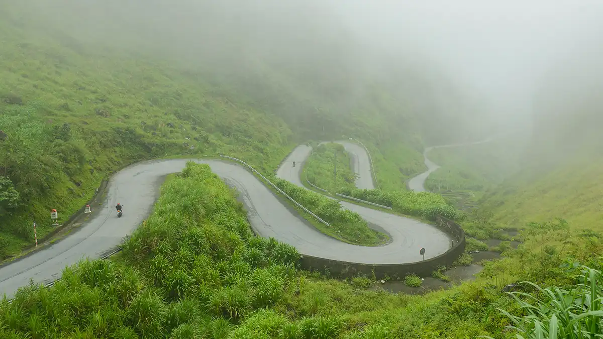 Foggy mountain road in Ha Giang during poor visibility