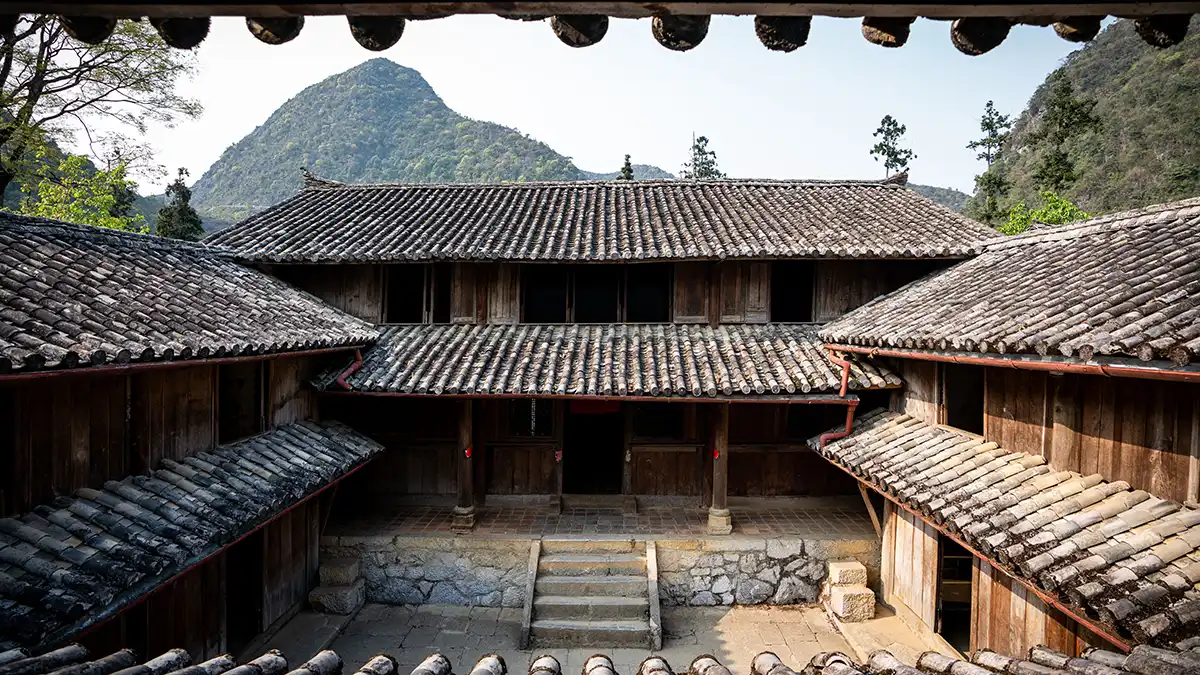 Traditional wooden buildings at Hmong King Palace in Ha Giang