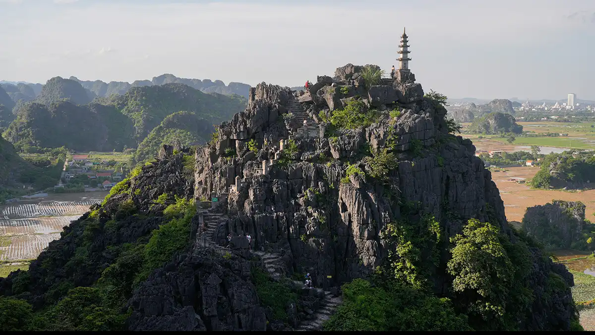 Hang Mua viewpoint above limestone hills and rice fields in Ninh Binh