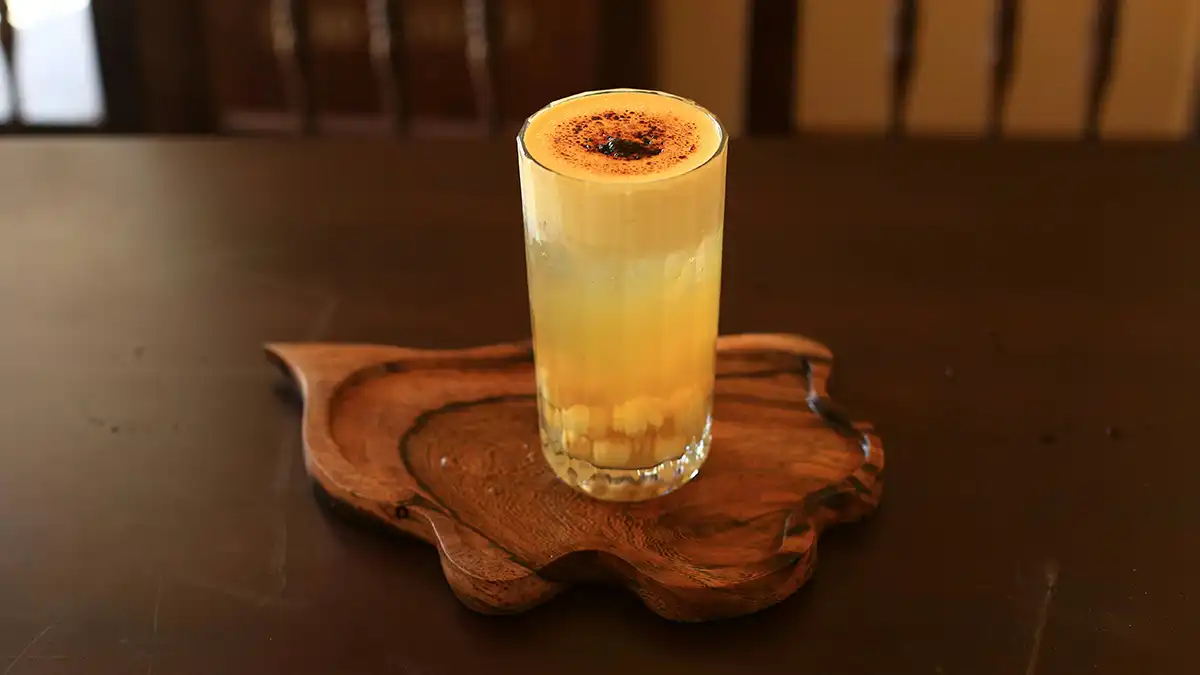 Vietnamese egg coffee in a small glass