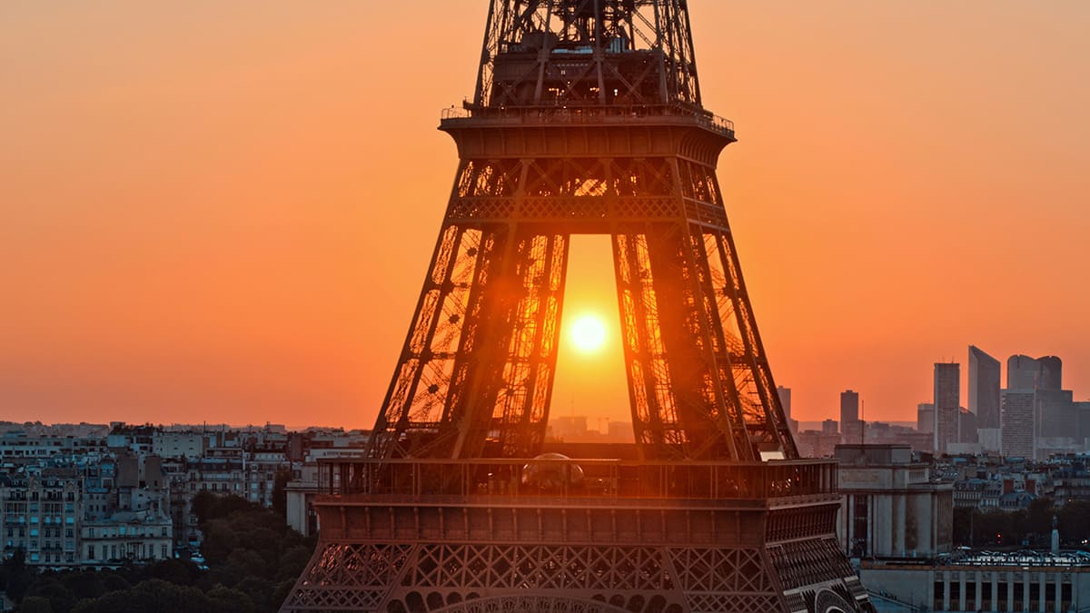 Eiffel Tower during sunset with Paris skyline and warm evening colors