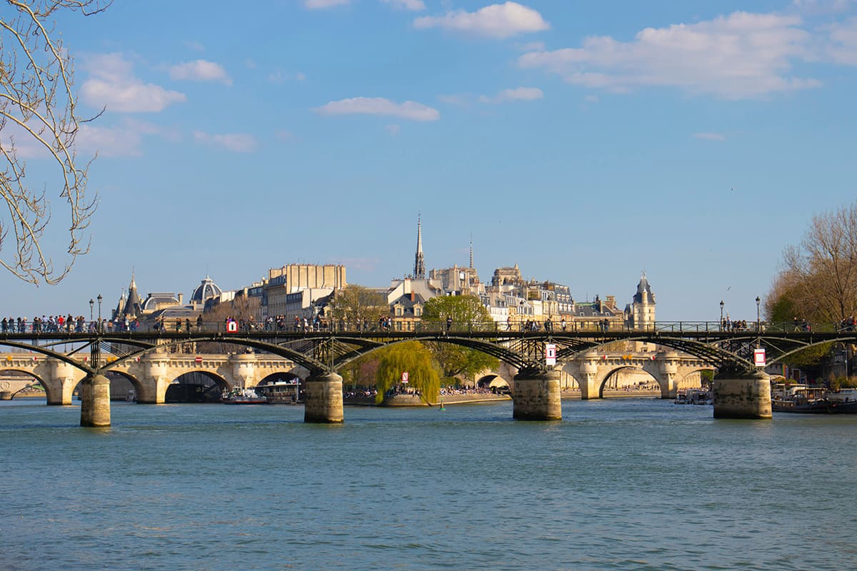 Bridge over the Seine River near Île Saint-Louis with views of historic Paris buildings