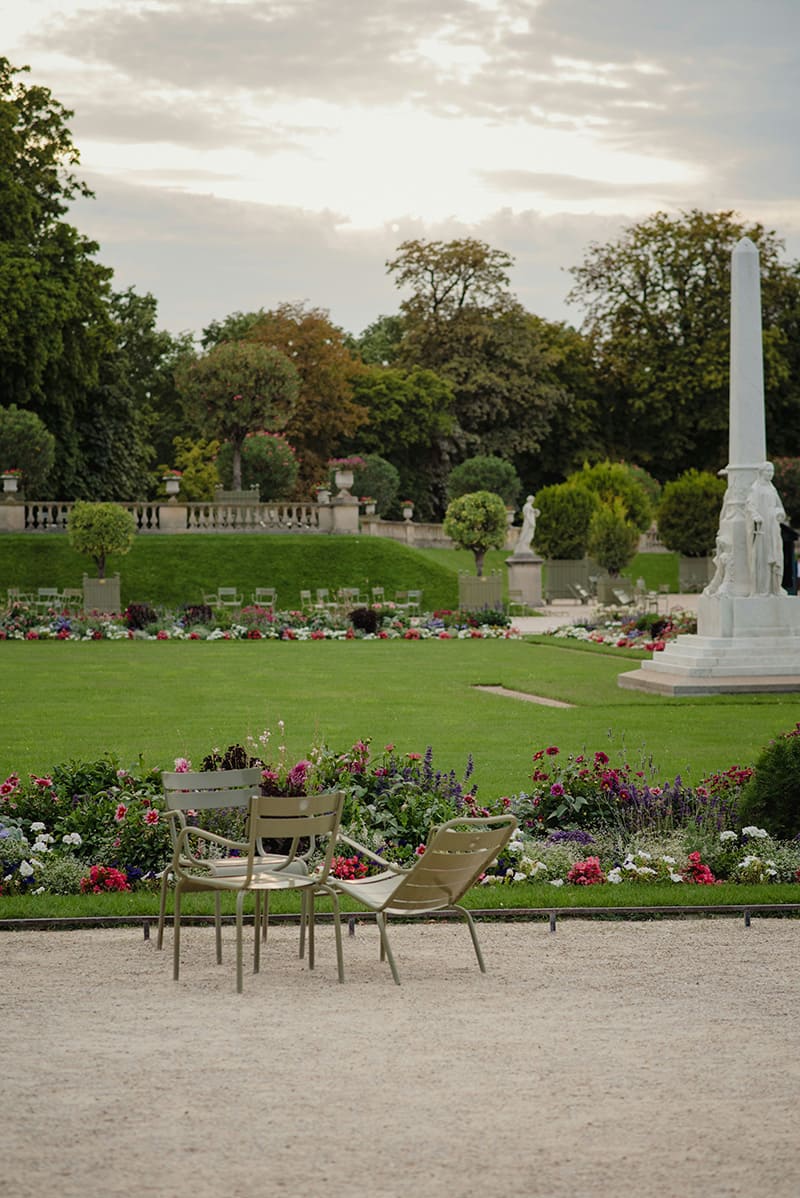 Chairs and peaceful garden area in Luxembourg Gardens Paris