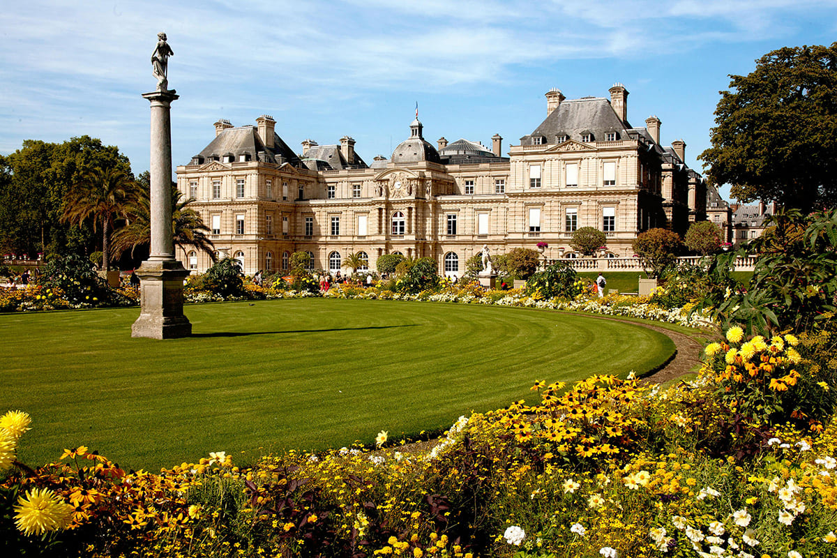 Luxembourg Palace surrounded by flowers and gardens in Paris