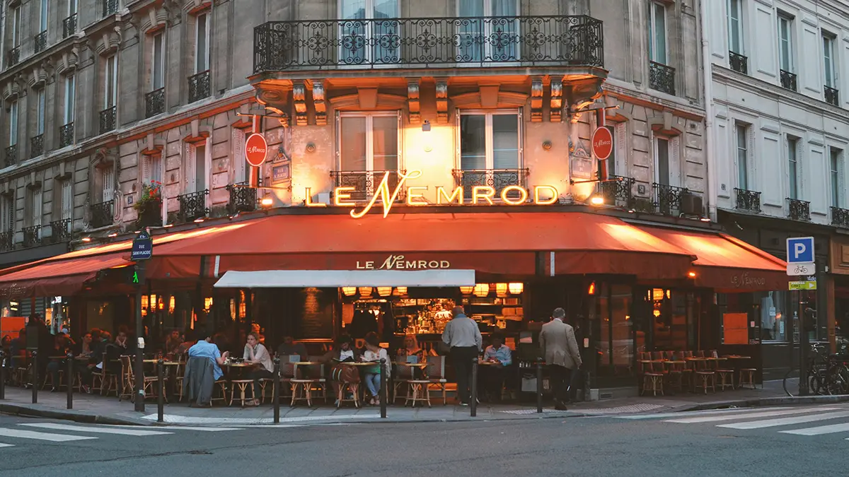 Corner café with outdoor tables in the Saint-Germain area of Paris