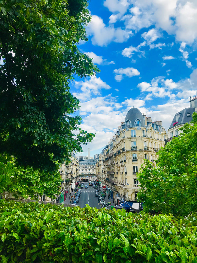 Promenade Plantée elevated park with lush greenery overlooking Paris streets