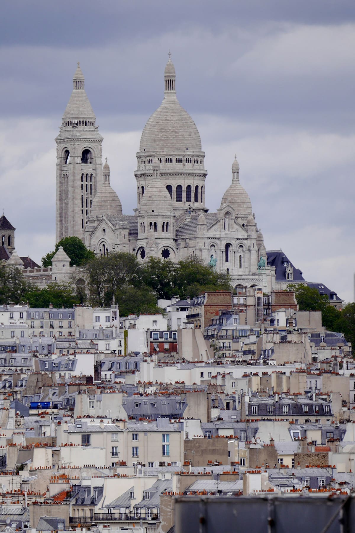 Sacré Coeur Basilica rising above Paris skyline in Montmartre district
