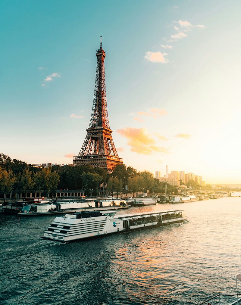 Boat cruising on the Seine River near Eiffel Tower in Paris