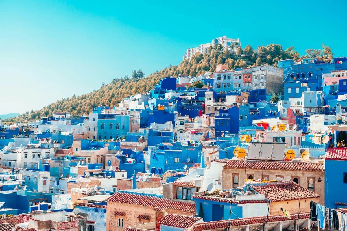 Blue buildings covering the hillside of Chefchaouen in the Rif Mountains of Morocco