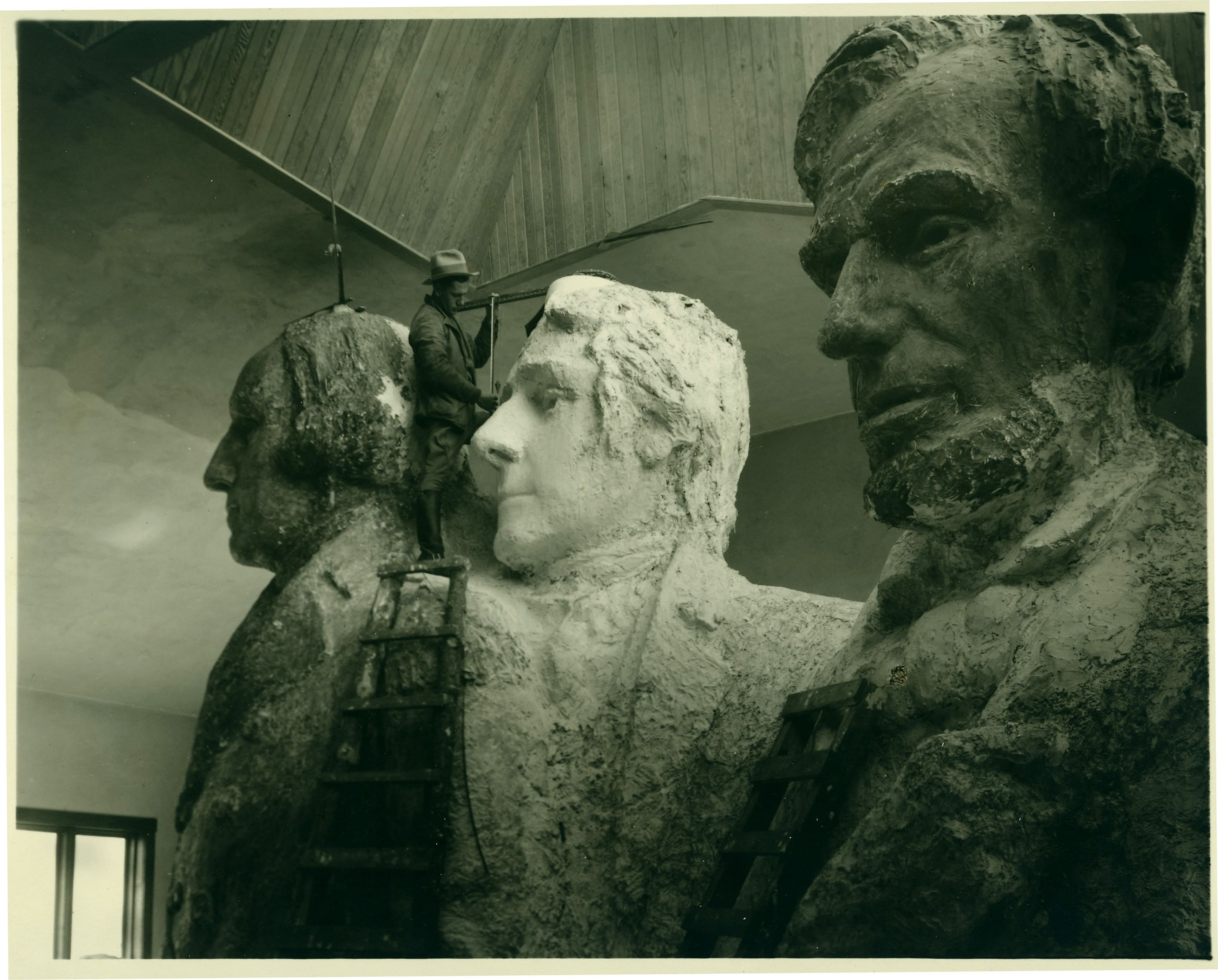 model of Mount Rushmore in the first sculptors studio