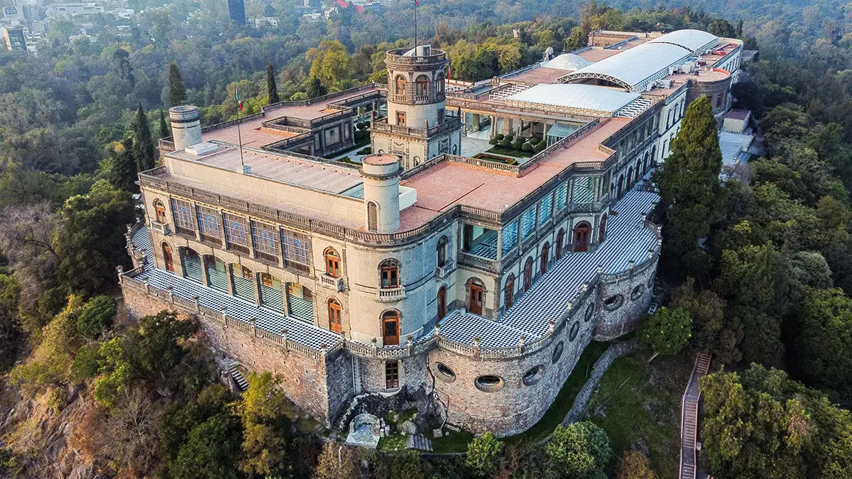 Chapultepec Castle above the trees in Mexico City at sunset