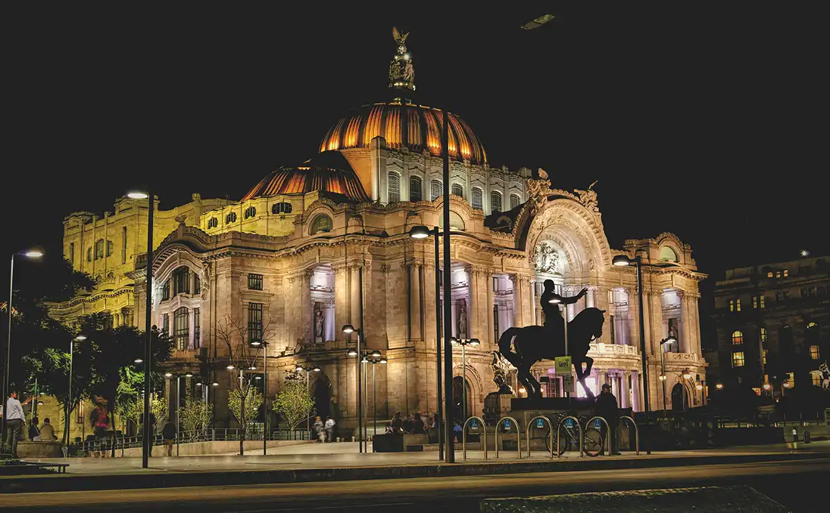 Palacio de Bellas Artes illuminated at night in central Mexico City