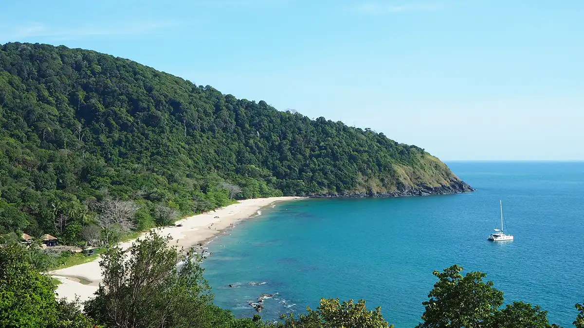 Quiet beach and green coastline on Koh Lanta Thailand