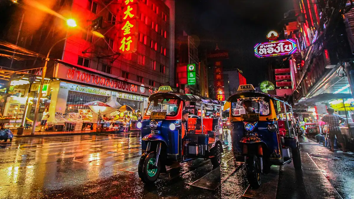 Bangkok tuk-tuks at night during a first Thailand trip