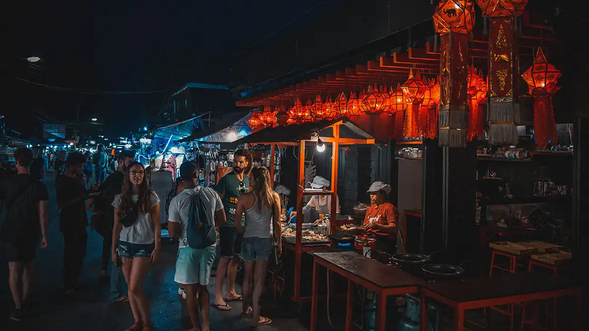 Thai street food stall at a night market during a first Thailand trip